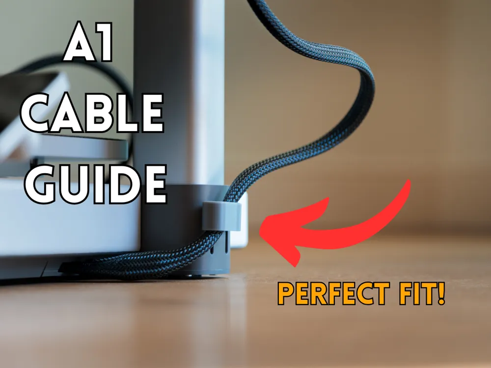Small 3D-printed guide clipped to the base of a Bambu Lab A1, routing the braided cable neatly out from under the machine